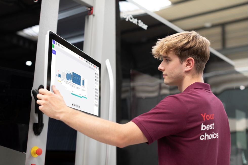 Machine laser cutting of steel sheets with a high-powered laser cutting machine.